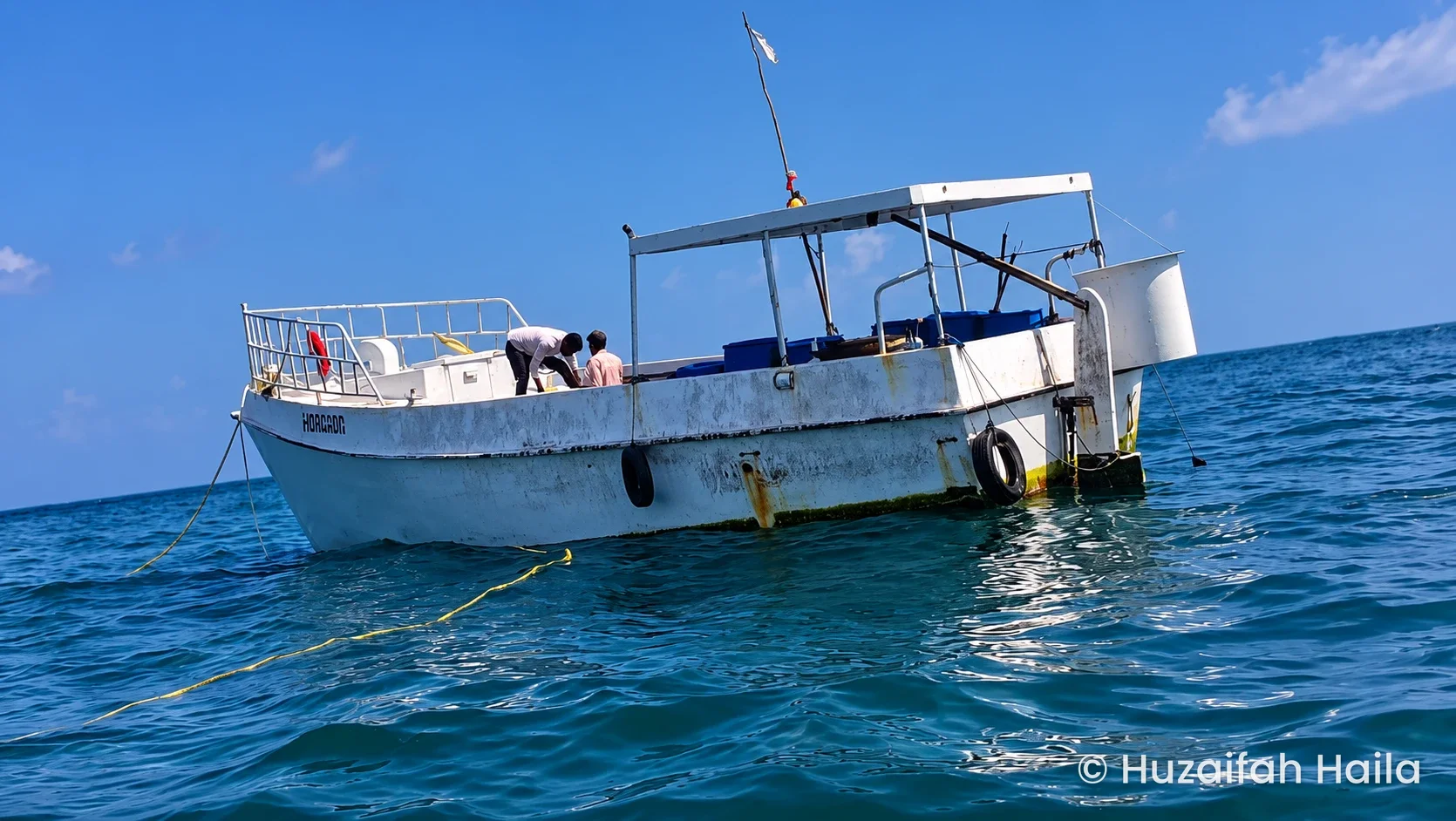 The Horaad fishing boat at anchor in clear blue water off the Somali coast