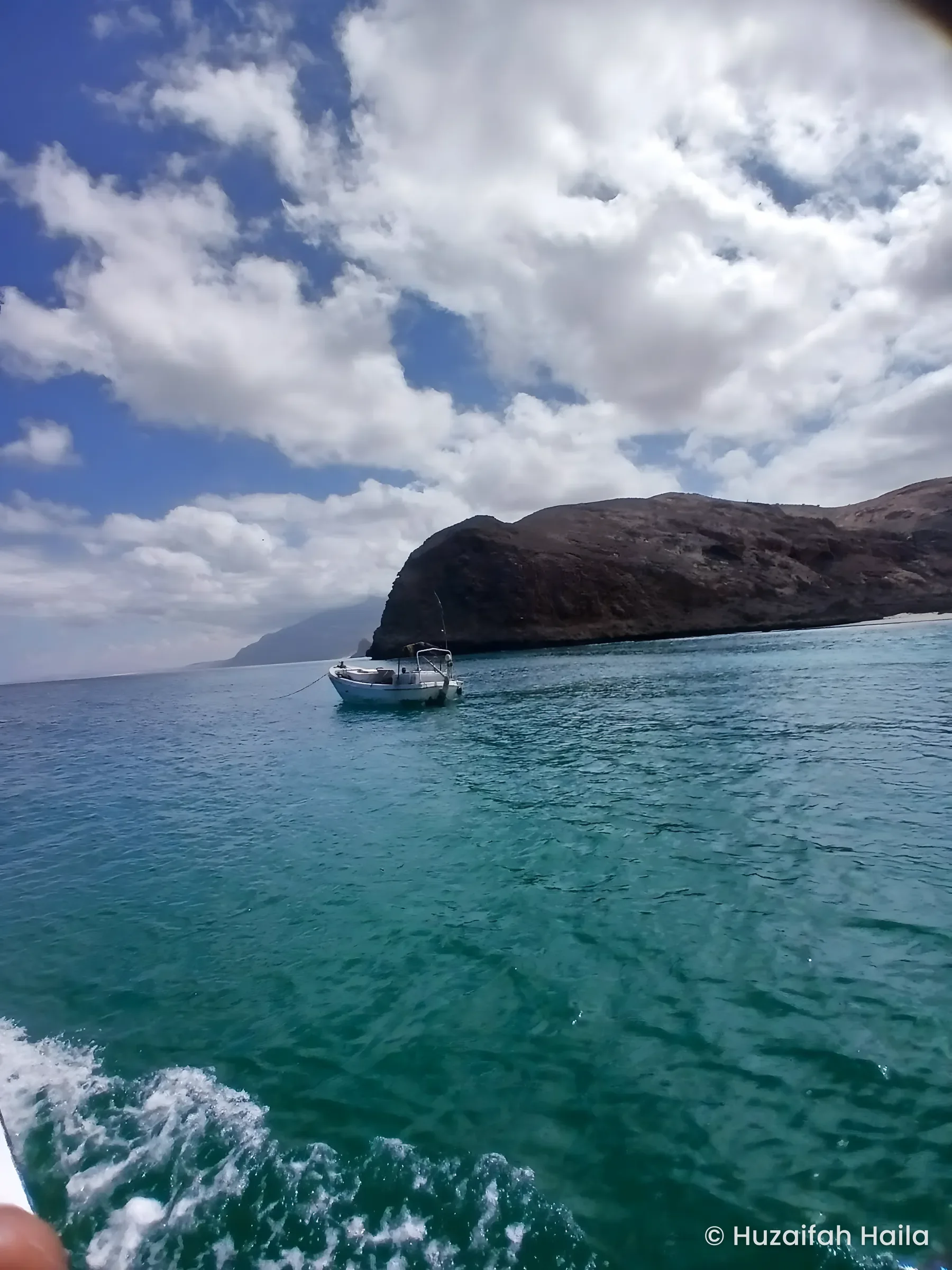 Wake near rocky headland, aboard the Horaad fishing boat, Bari, Somalia